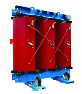 Cast coil transformer with red epoxy-coated windings and blue structural frame mounted on wheels