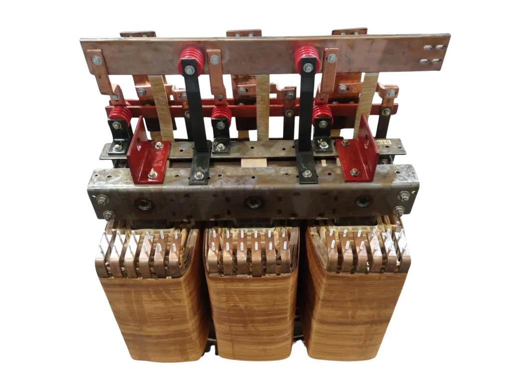 Three-phase PDU transformer with wooden core, red and black mechanical components, and brass terminals mounted on metal